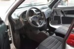 Vue arrière avec feux et pare-chocs, état carrosserie détaillé