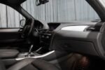 Siège conducteur et console centrale, état de sellerie contrôlé