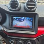 Vue intérieure côté passager avec rangement et ceinture
