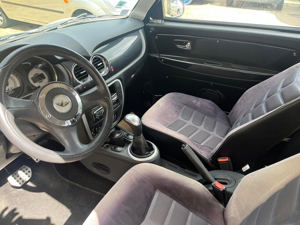 Vue arrière microcar montrant feux et hayon