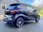 Angle bas montrant la garde au sol et l'état du bas de caisse