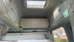 Banquette trois places convertible en couchage supplémentaire