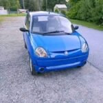 Vue avant gauche du véhicule microcar diesel, carrosserie intacte