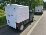 Profil latéral du D-Truck montrant la cabine 4 portes et la benne arrière