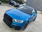 Vue latérale du véhicule garé, roues en alliage visibles