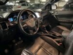 Détail des commandes au volant et du régulateur de vitesse